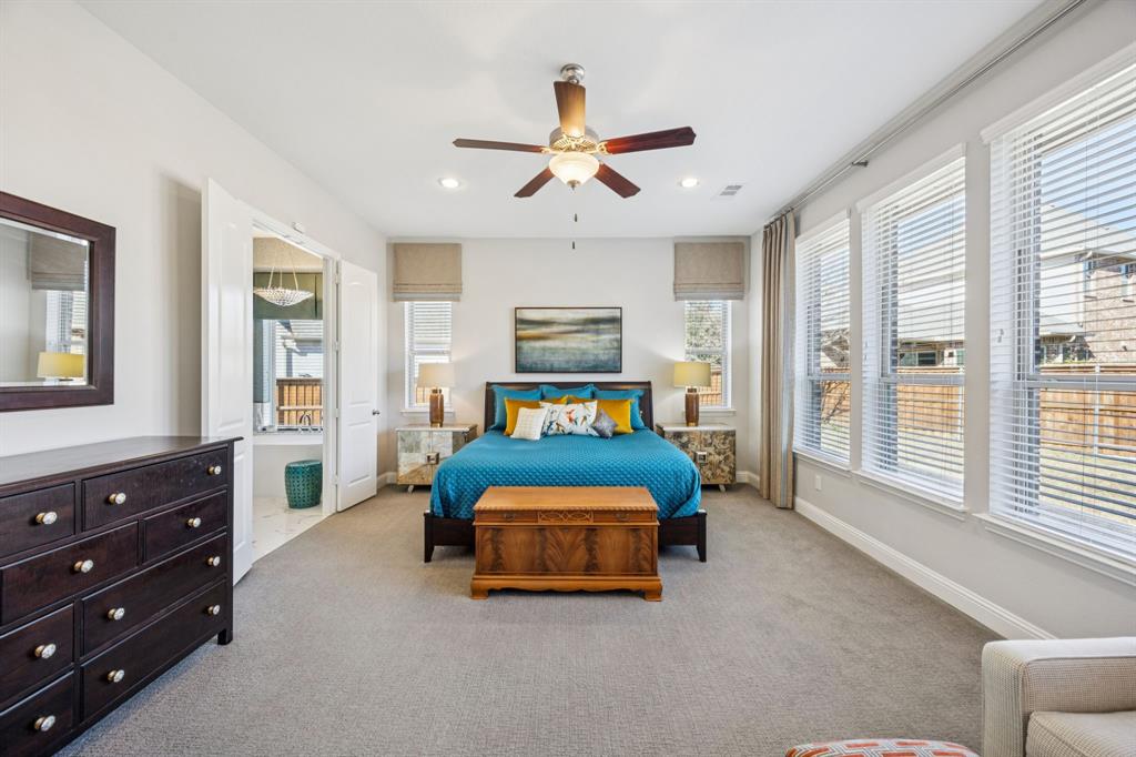 1392 Rolling Thunder Road Frisco, TX 75036 - Photo 19 of 40 a living room with furniture and a chandelier