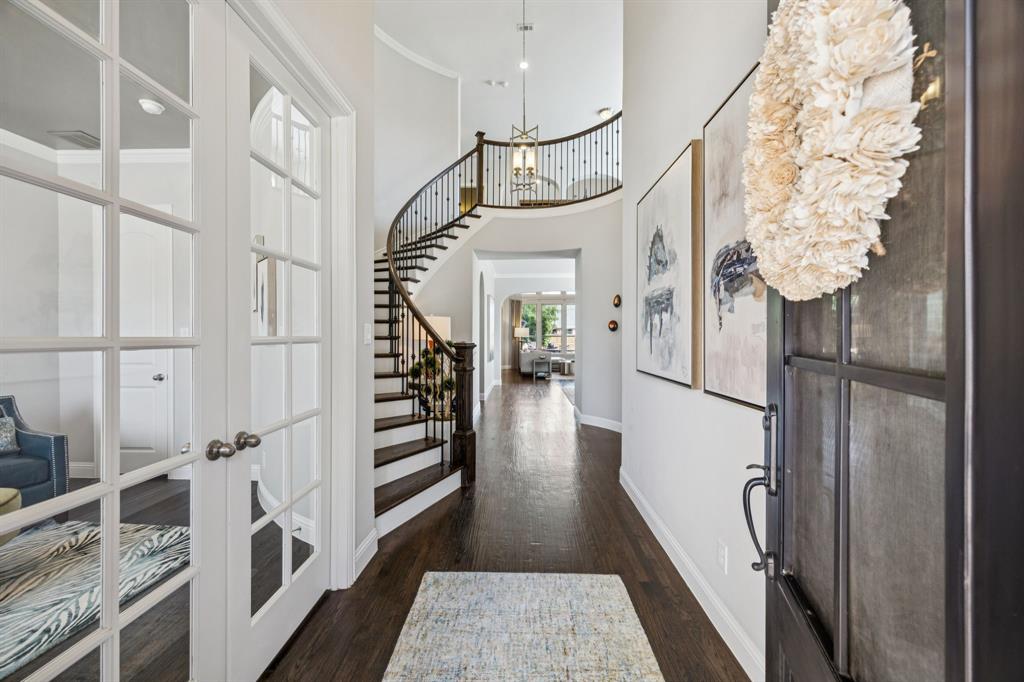 1392 Rolling Thunder Road Frisco, TX 75036 - Photo 2 of 40 a view of entryway and hall with wooden floor