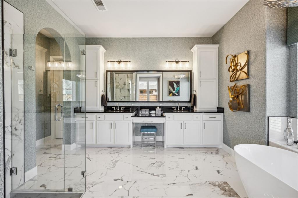 1392 Rolling Thunder Road Frisco, TX 75036 - Photo 22 of 40 a bathroom with a sink toilet and shower