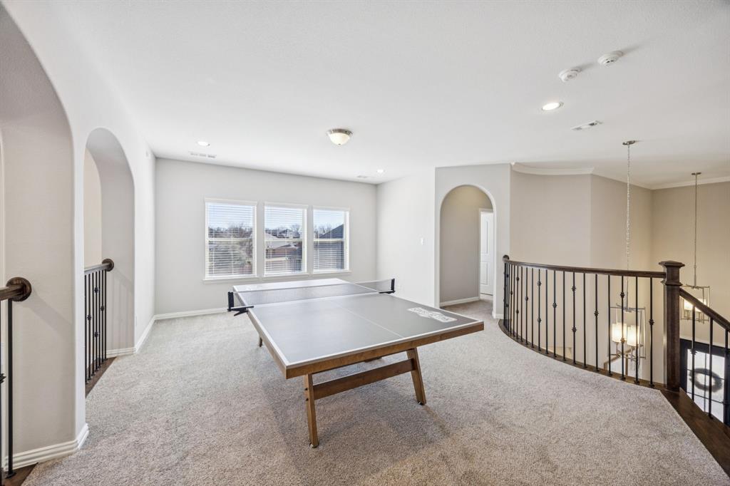 1392 Rolling Thunder Road Frisco, TX 75036 - Photo 26 of 40 a view of livingroom with furniture and window