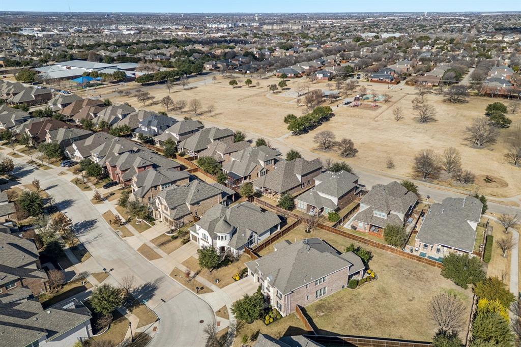 1392 Rolling Thunder Road Frisco, TX 75036 - Photo 38 of 40 an aerial view of residential houses with outdoor space