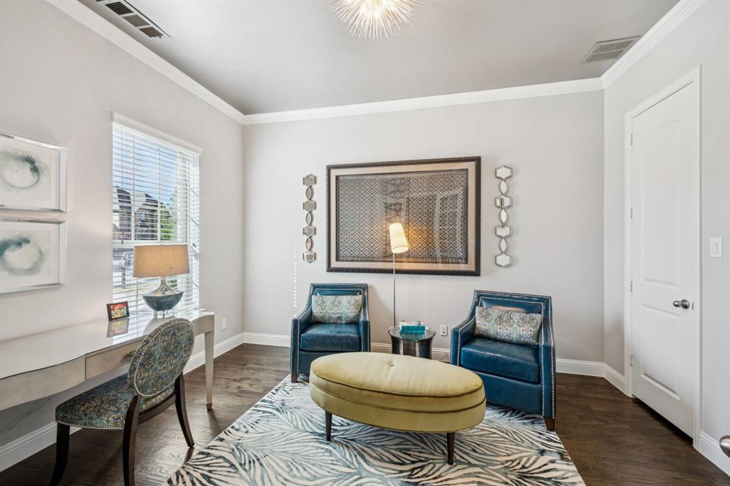 1392 Rolling Thunder Road Frisco, TX 75036 - Photo 4 of 40 a living room with a couch and a table
