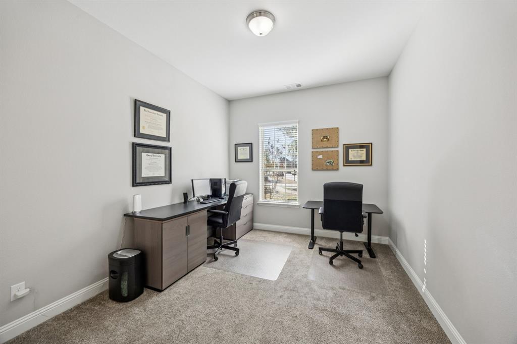 1392 Rolling Thunder Road Frisco, TX 75036 - Photo 5 of 40 a view of a workspace with furniture