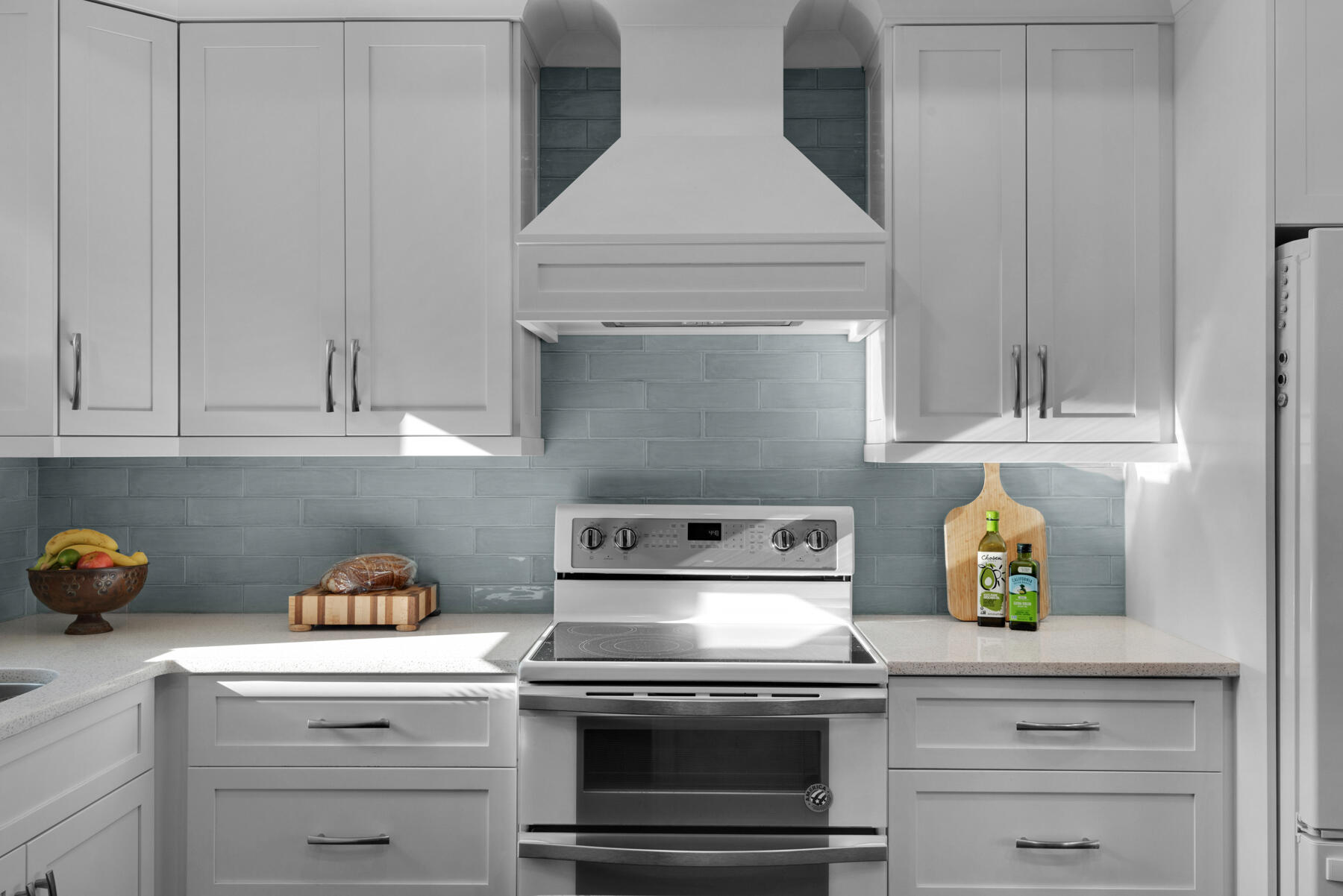 515 Whitfield Road Freeport, FL 32439 - Photo 11 of 39 a kitchen with a stove and cabinets