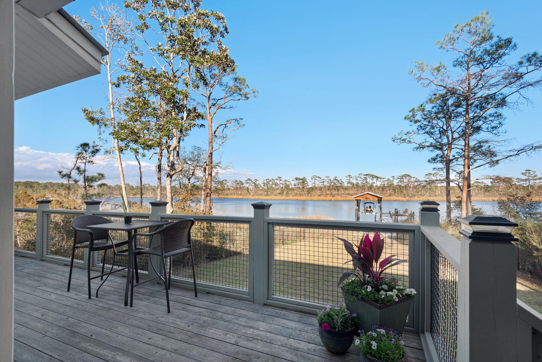 515 Whitfield Road Freeport, FL 32439 - Photo 16 of 39 a view of a terrace with furniture and stove