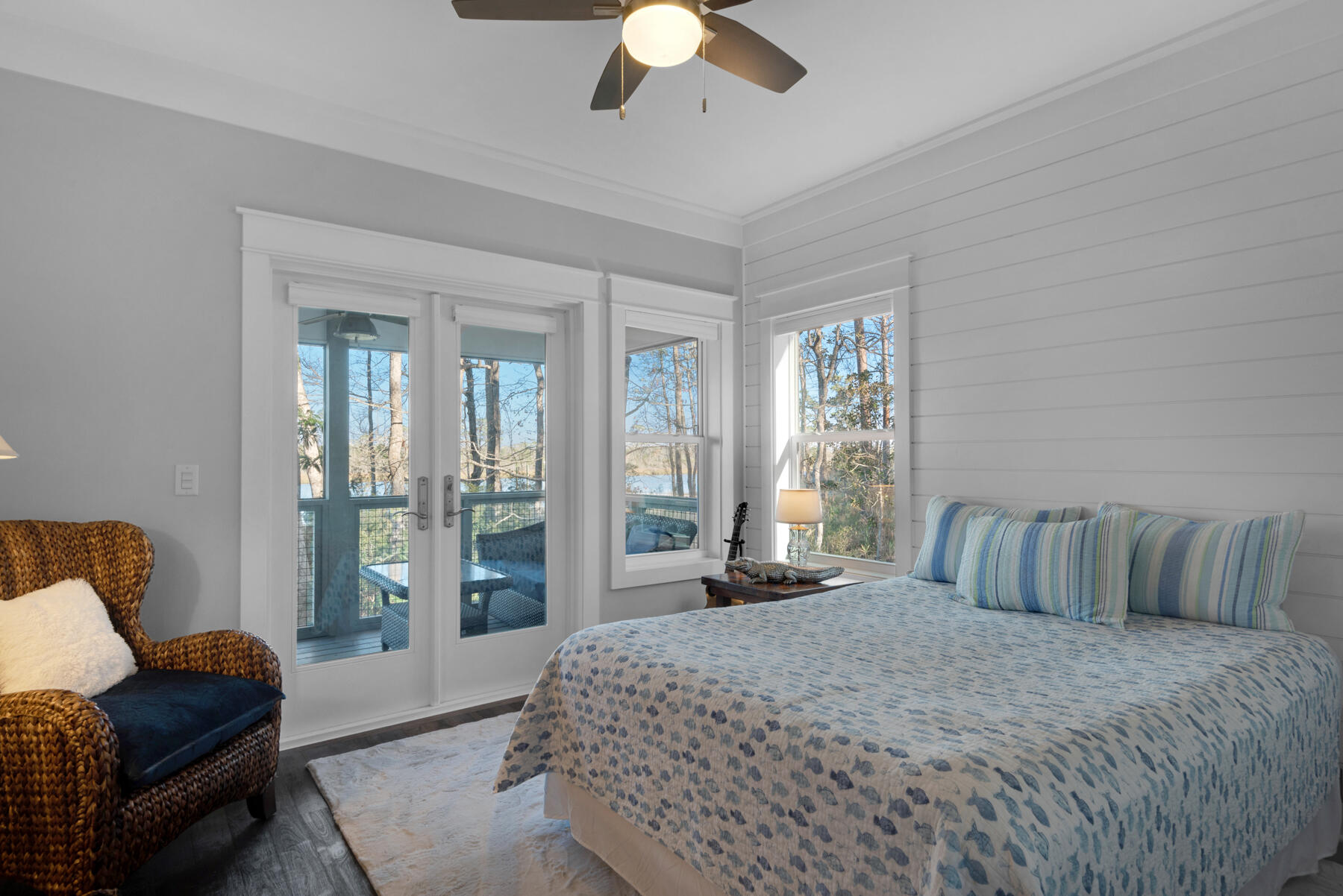 515 Whitfield Road Freeport, FL 32439 - Photo 24 of 39 a bedroom with a bed and glass walk in closet