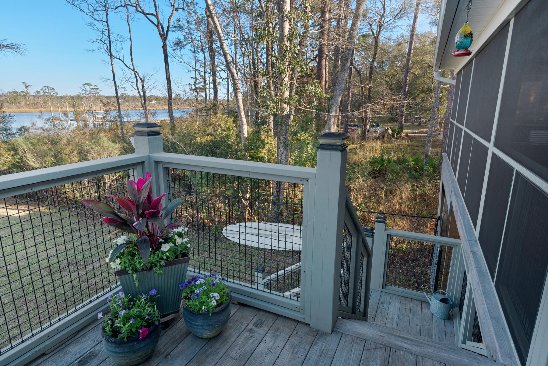 515 Whitfield Road Freeport, FL 32439 - Photo 27 of 39 a view of balcony with wooden floor