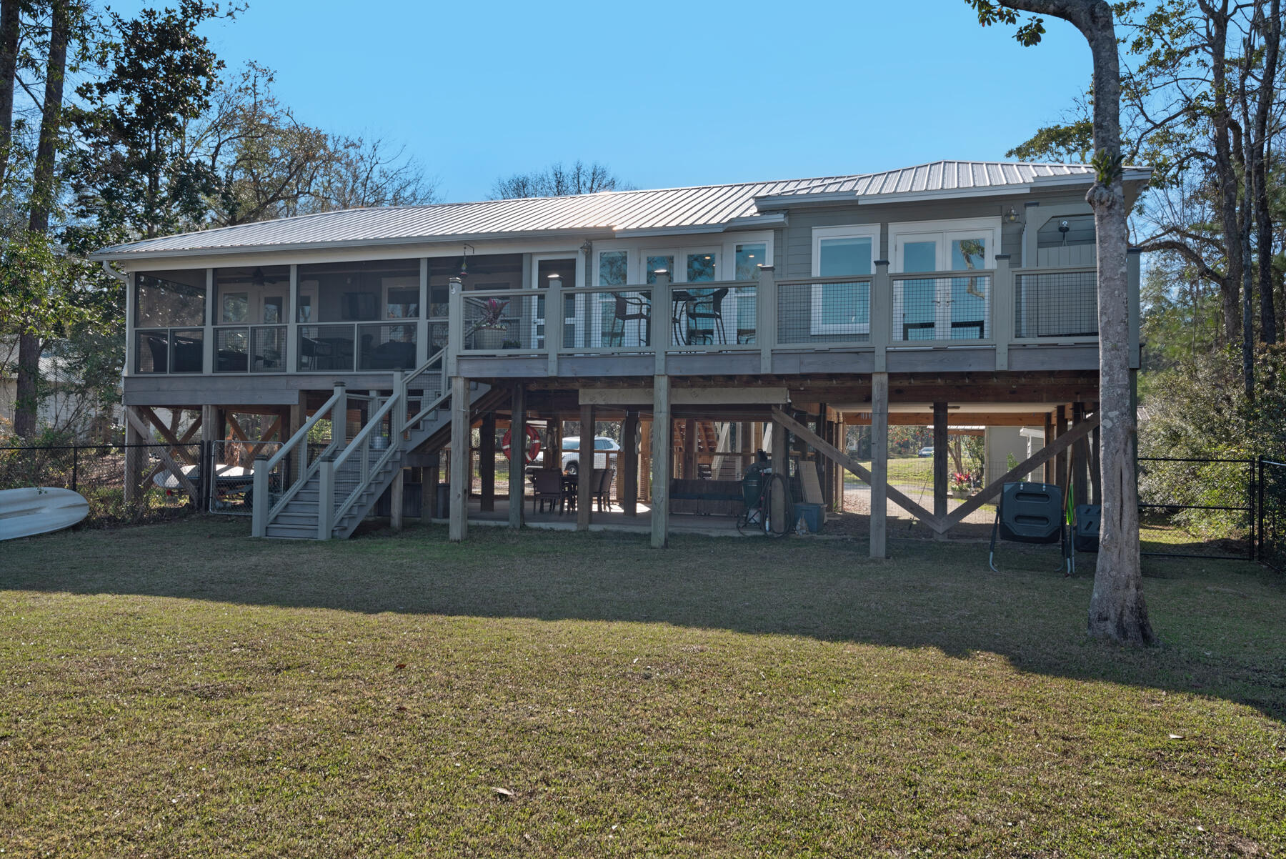 515 Whitfield Road Freeport, FL 32439 - Photo 32 of 39 a front view of a house with a yard
