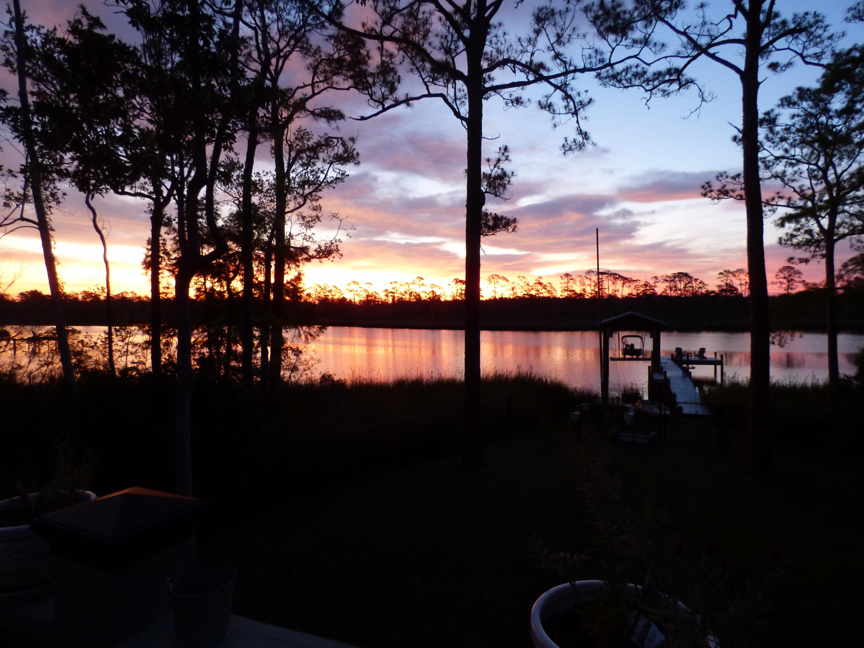 515 Whitfield Road Freeport, FL 32439 - Photo 37 of 39 a view of a lake from a balcony