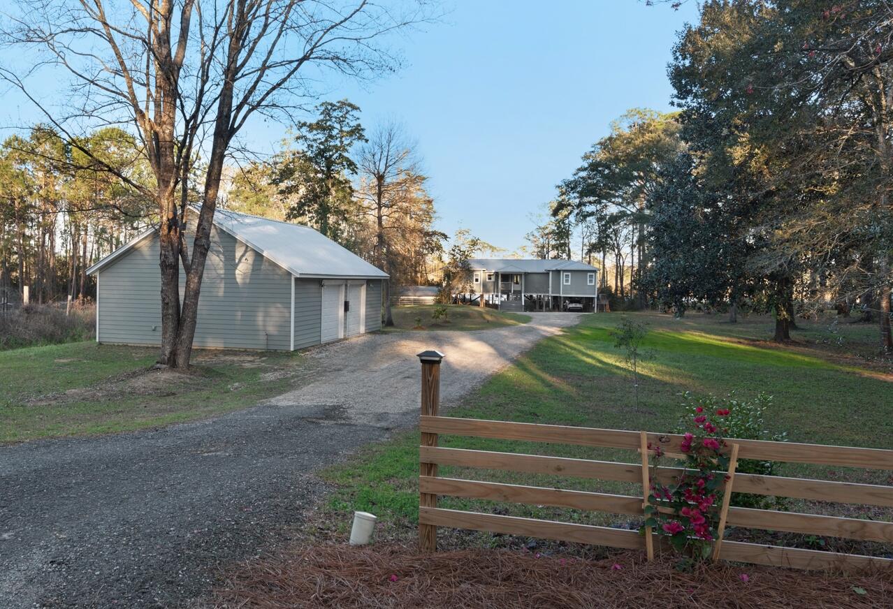 515 Whitfield Road Freeport, FL 32439 - Photo 6 of 39 a view of a house with a yard