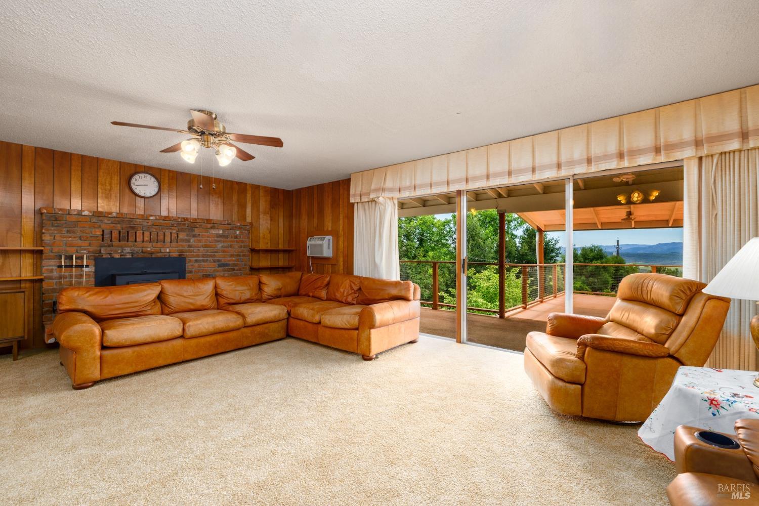 1135 Palomino Road Cloverdale, CA 95425 - Photo 12 of 42 a living room with furniture and a large window