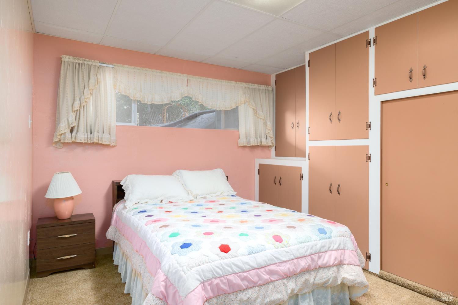 1135 Palomino Road Cloverdale, CA 95425 - Photo 25 of 42 a bedroom with a bed and a window