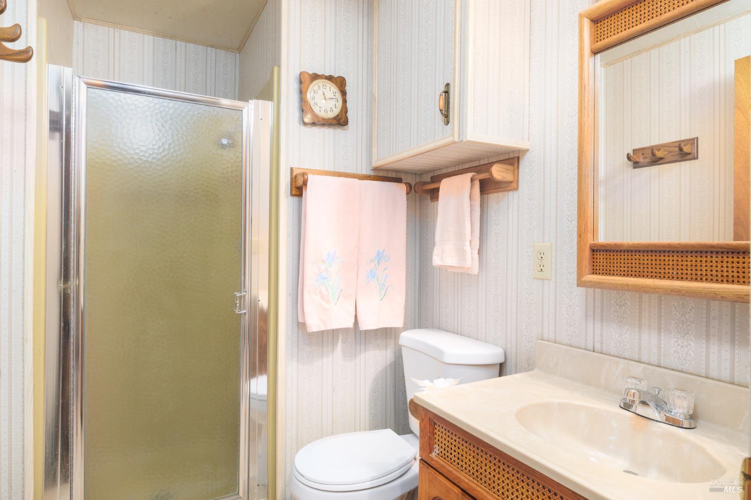 1135 Palomino Road Cloverdale, CA 95425 - Photo 26 of 42 a bathroom with a sink toilet and shower