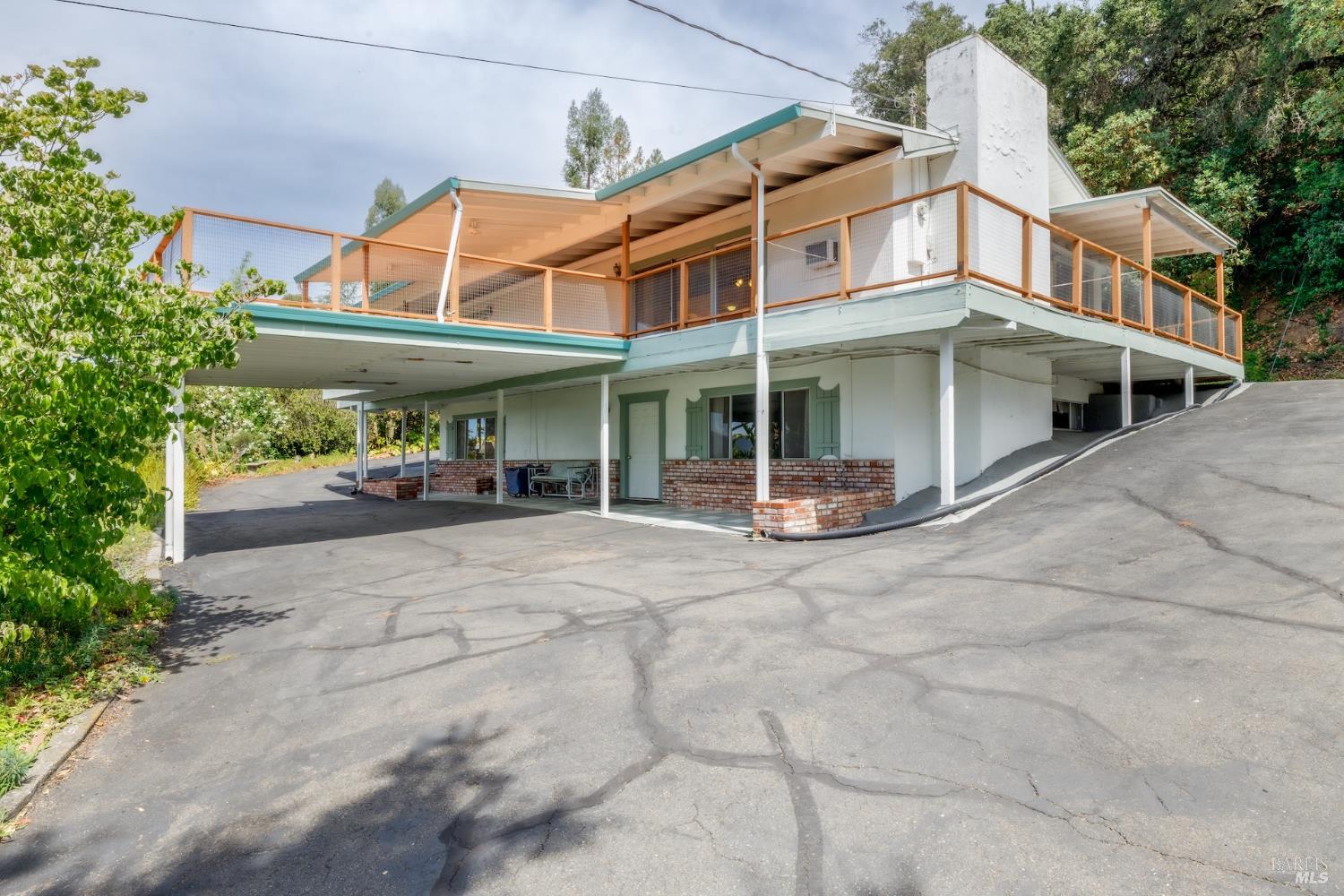 1135 Palomino Road Cloverdale, CA 95425 - Photo 7 of 42 a couple of table and chairs in front of house