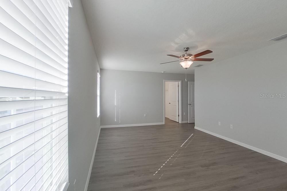 4397 Southwest 85th Lane Ocala, FL 34476 - Photo 18 of 23 a view of an empty room with a window