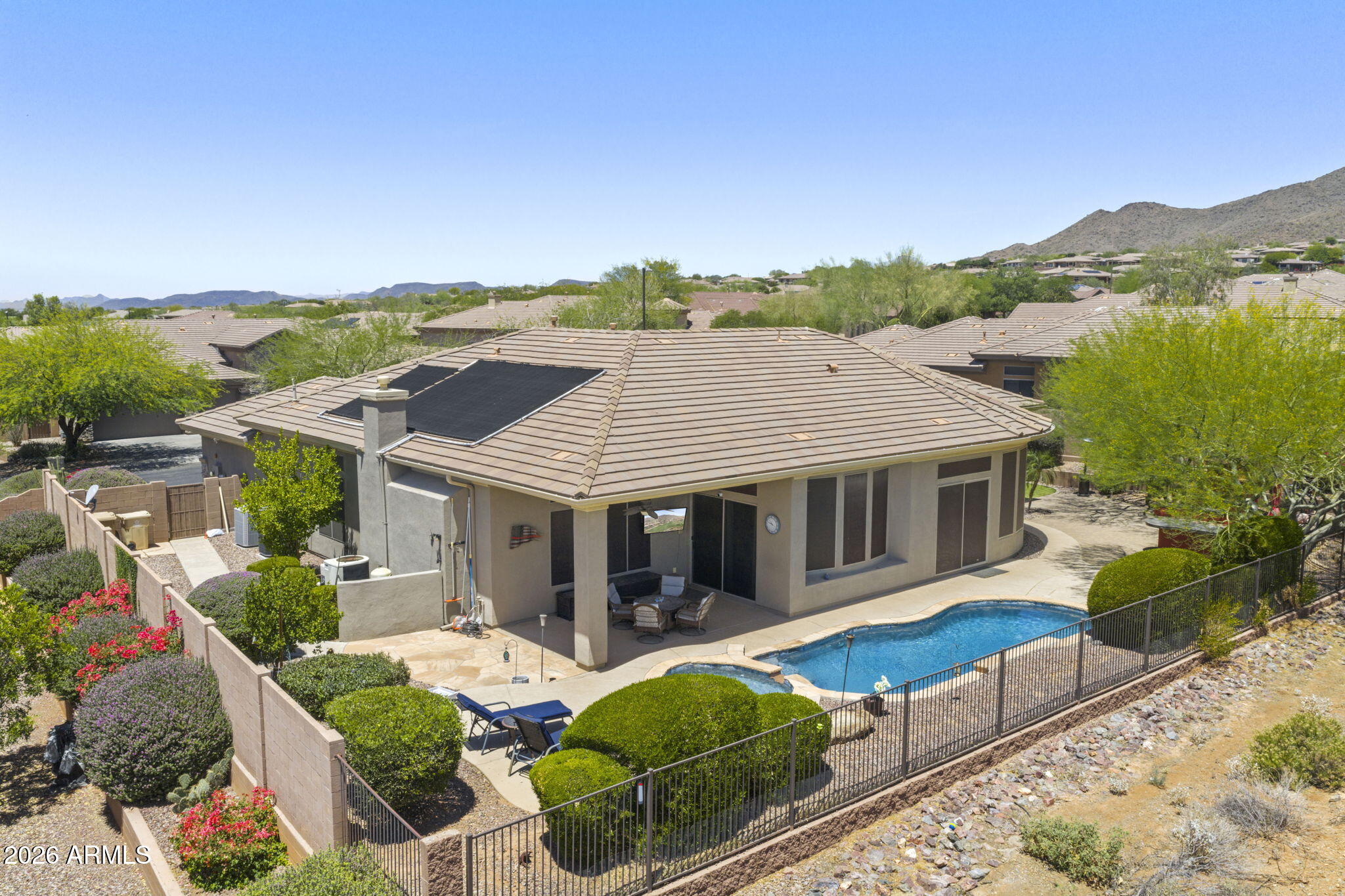 41619 North River Bend Road Anthem, AZ 85086 - Photo 60 of 84 a view of a house with pool and chairs
