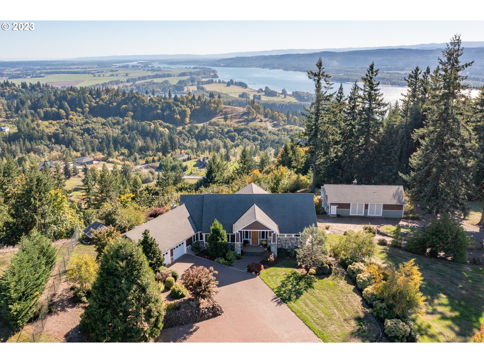 an aerial view of a house with a garden