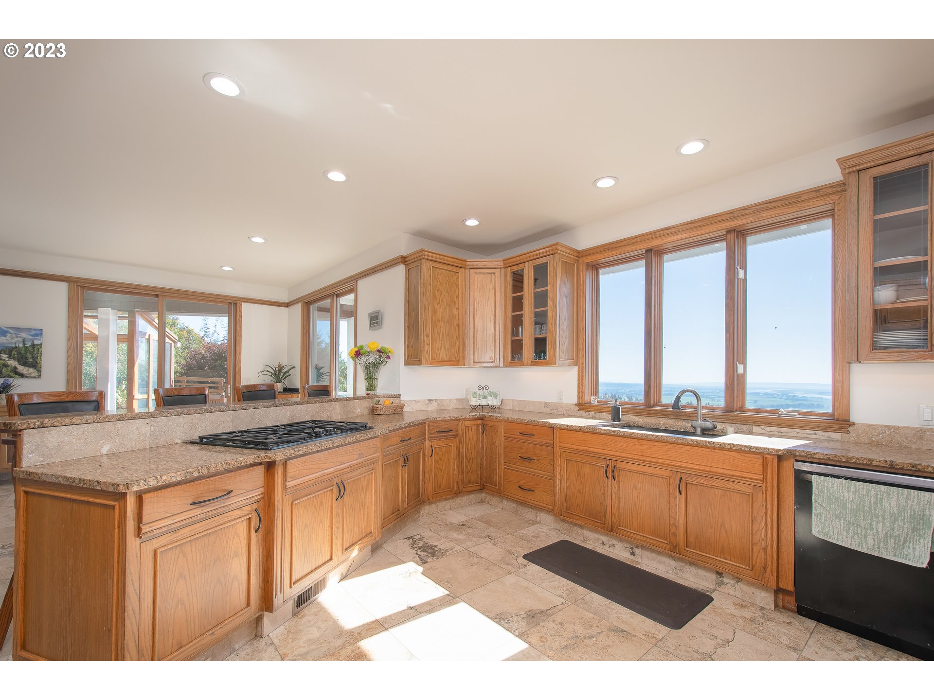 206 Pebble Lane Kalama, WA 98625 - Photo 16 of 47 a large kitchen with a sink and cabinets