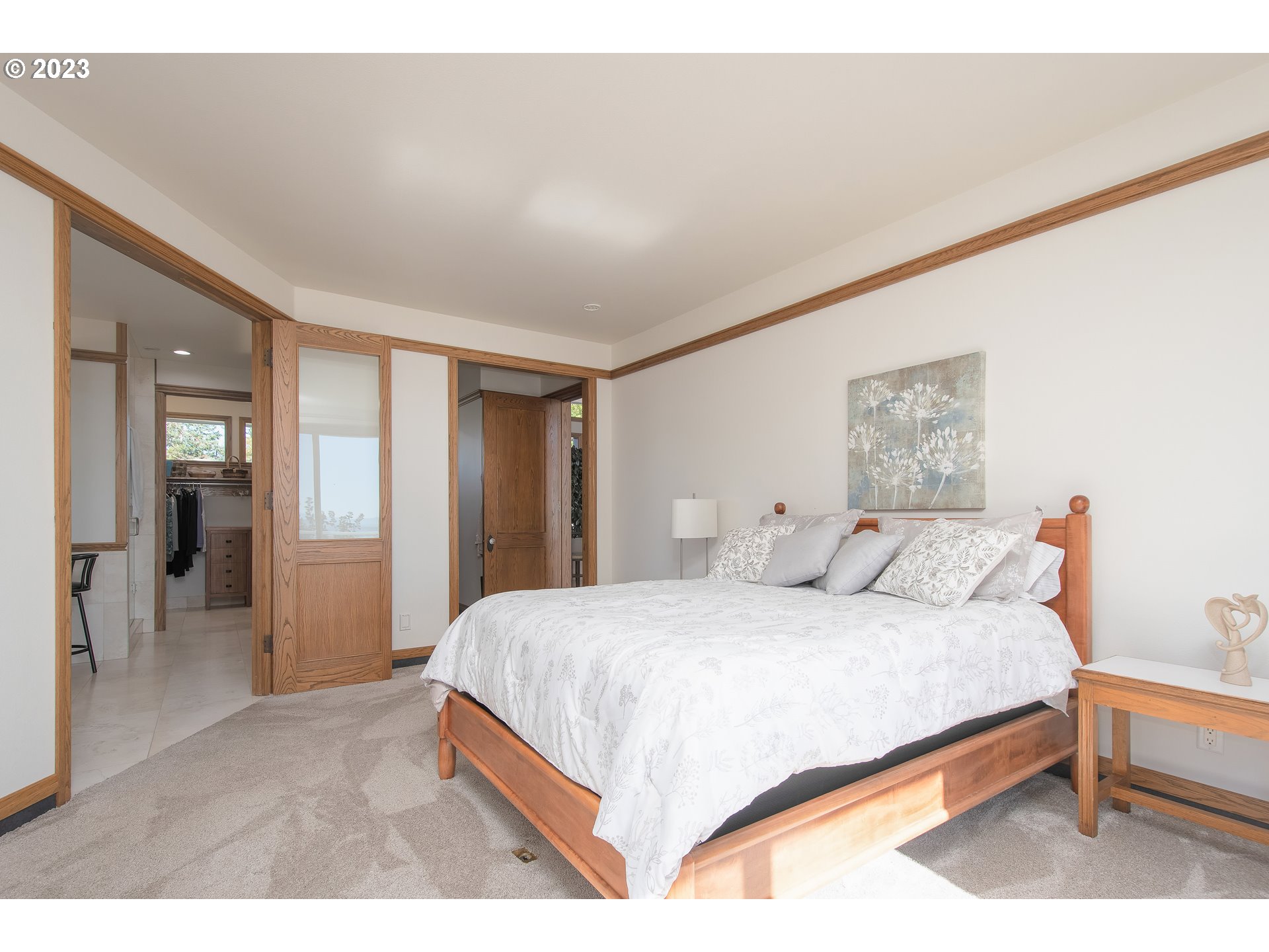 206 Pebble Lane Kalama, WA 98625 - Photo 21 of 47 a bedroom with a bed and a table