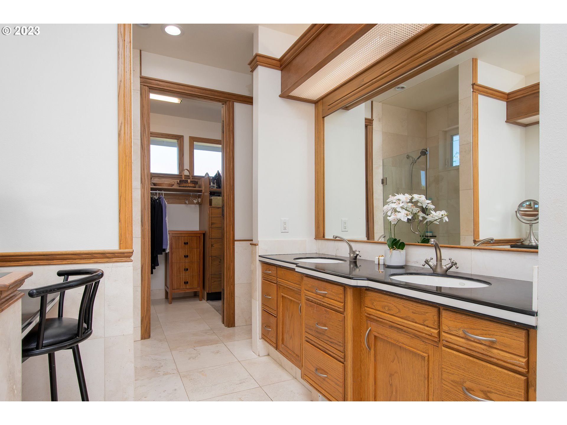 206 Pebble Lane Kalama, WA 98625 - Photo 23 of 47 a spacious bathroom with a granite countertop sink and a mirror