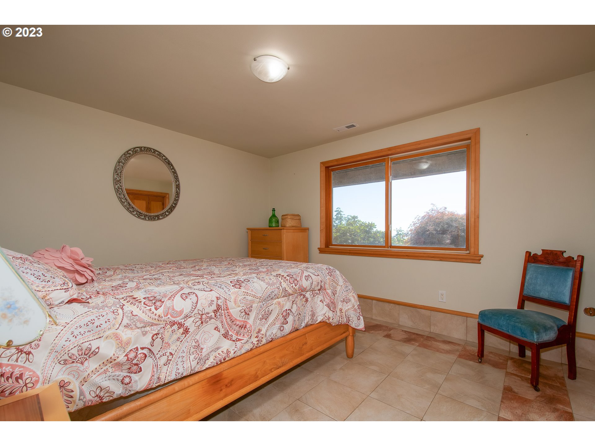 206 Pebble Lane Kalama, WA 98625 - Photo 29 of 47 a bedroom with a bed and a window