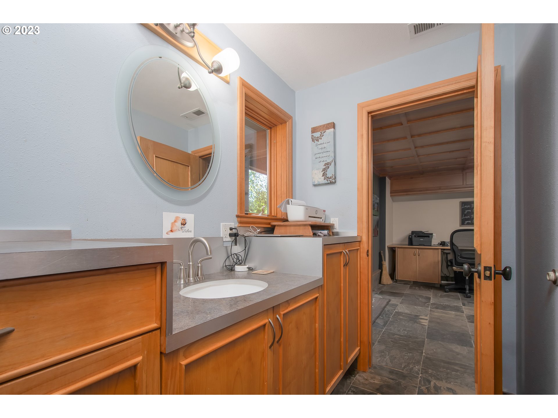 206 Pebble Lane Kalama, WA 98625 - Photo 32 of 47 a bathroom with a sink vanity and a mirror