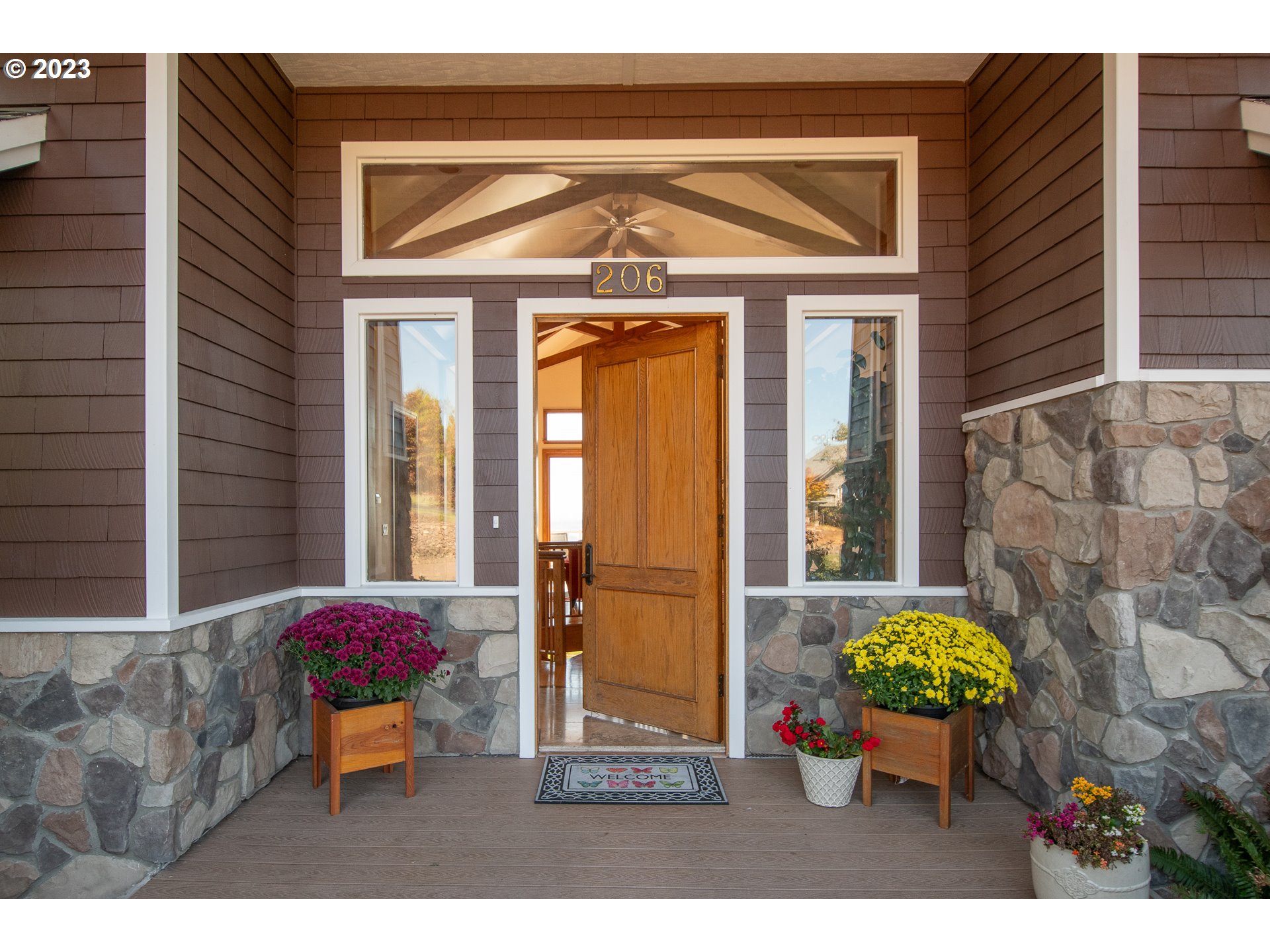 206 Pebble Lane Kalama, WA 98625 - Photo 4 of 47 a front view of a house with patio