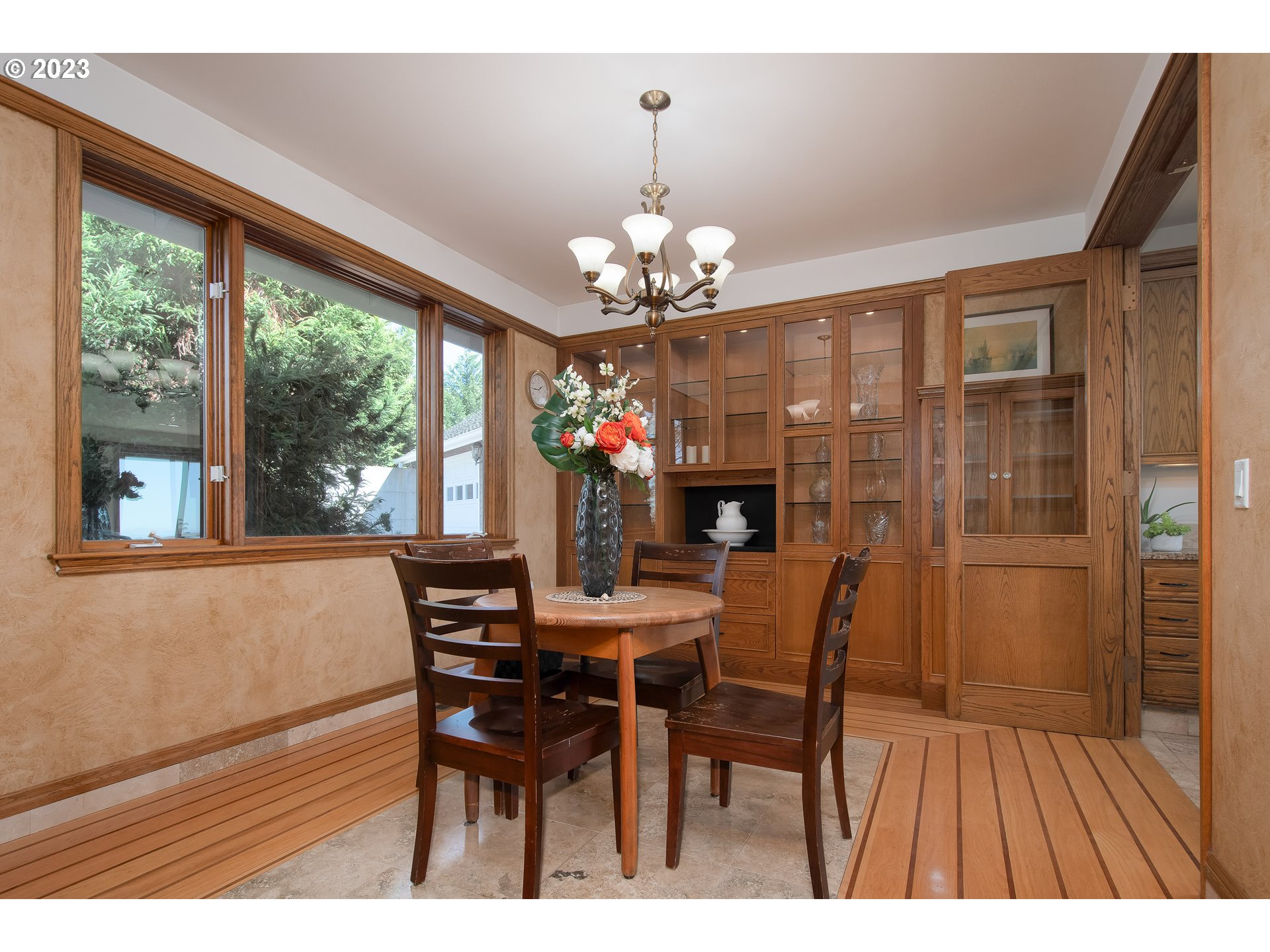 206 Pebble Lane Kalama, WA 98625 - Photo 9 of 47 a view of a dining room with furniture wooden floor and chandelier