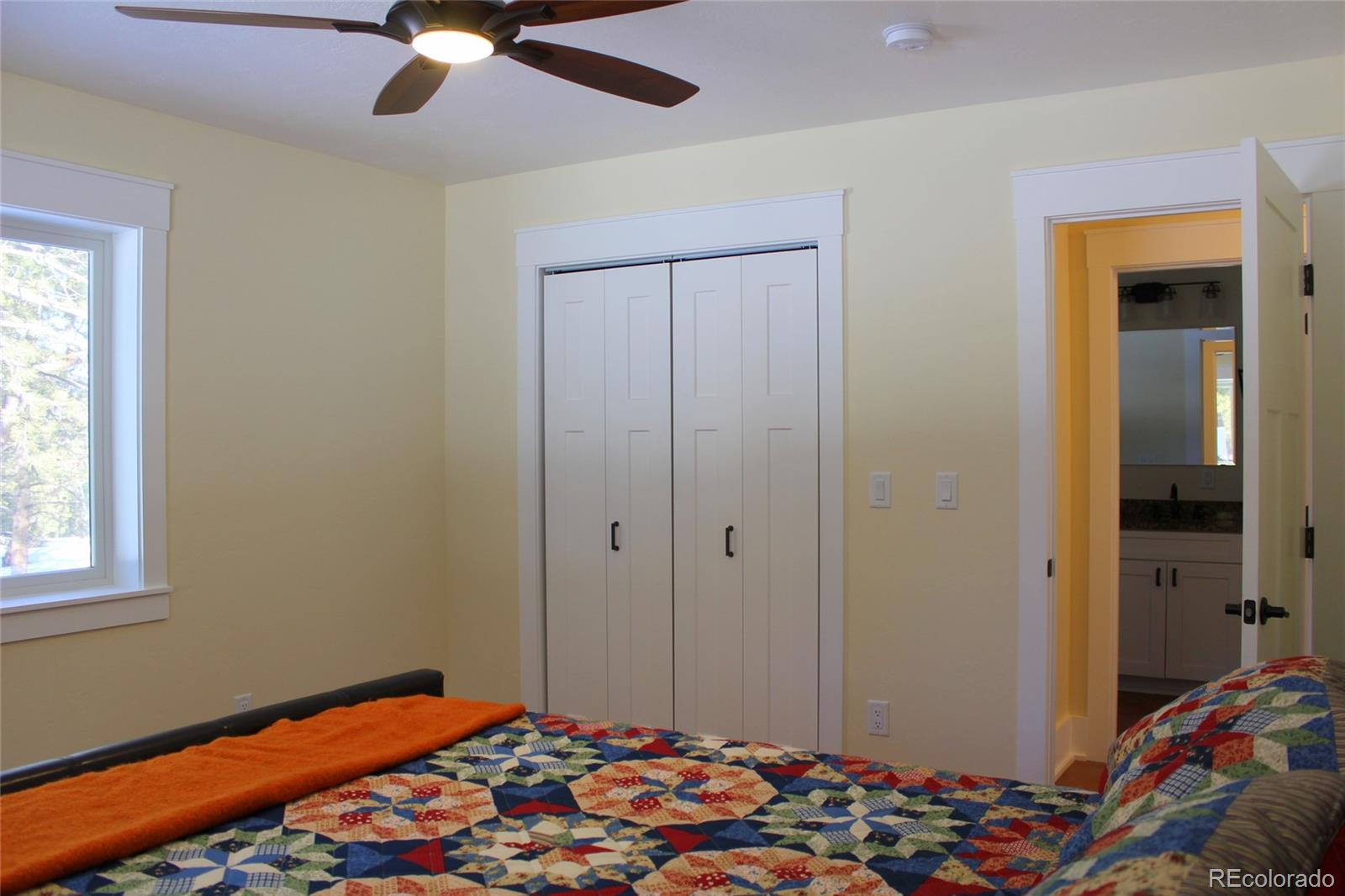 4147 Campfire Road Hartsel, CO 80449 - Photo 12 of 27 a bedroom with bed and a window