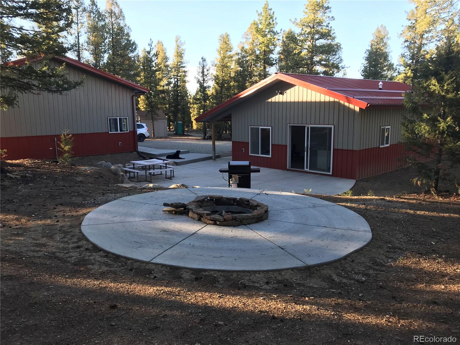4147 Campfire Road Hartsel, CO 80449 - Photo 20 of 27 a view of a house with backyard and sitting area