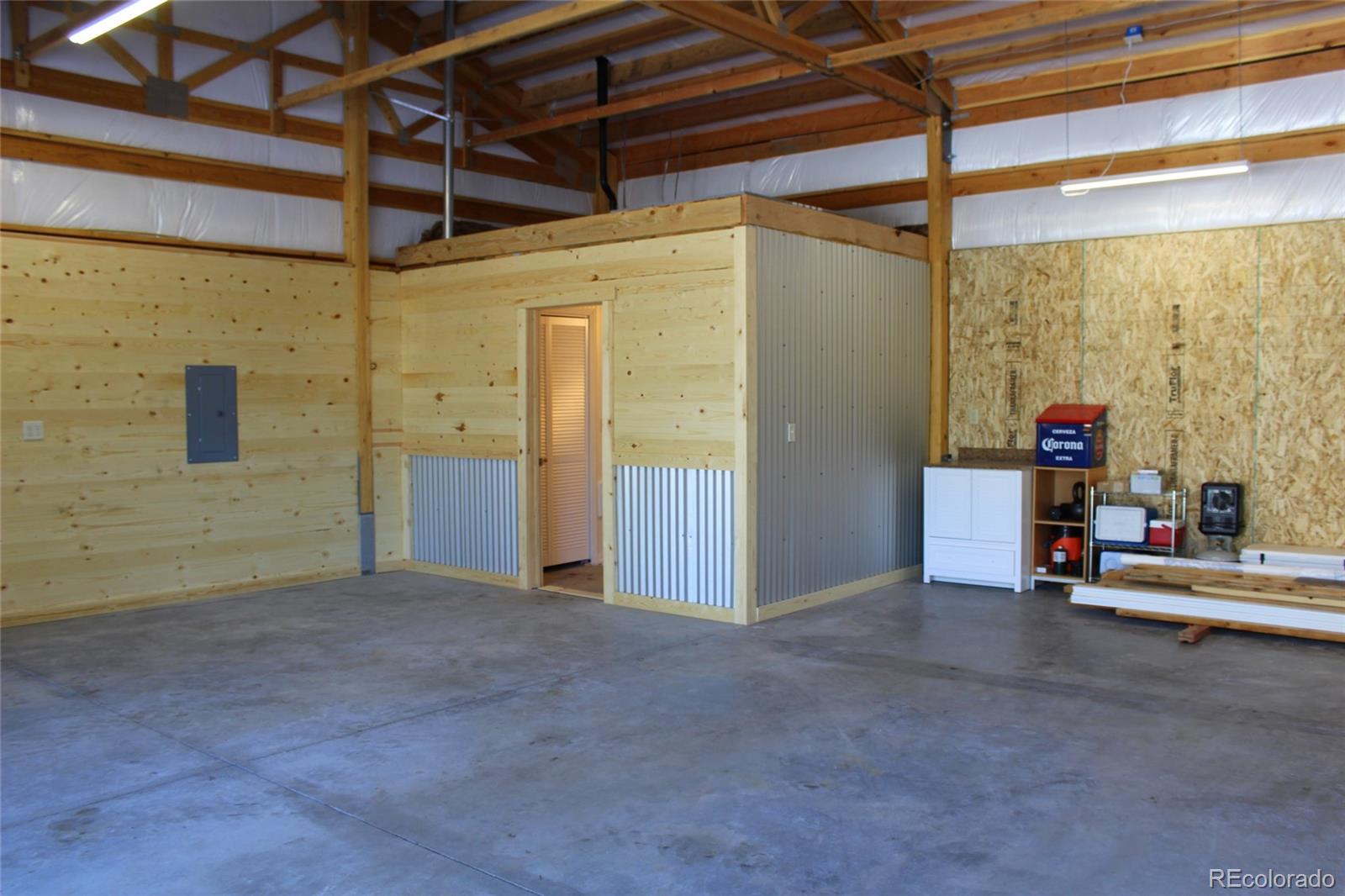 4147 Campfire Road Hartsel, CO 80449 - Photo 23 of 27 a view of empty room with air conditioner duct and furniture