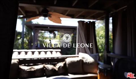 a childrens park with lots of swings and slides