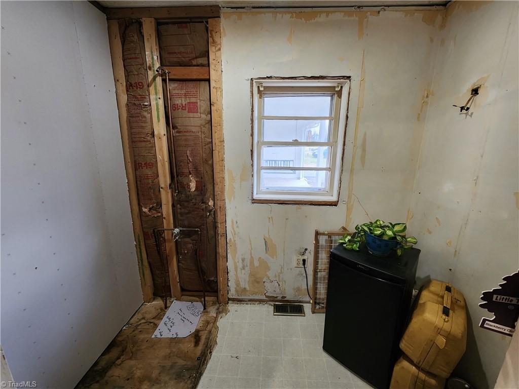 4521 Huff Road Archdale, NC 27263 - Photo 11 of 18 Primary bath has been gutted to the studs allowing you to come in fresh and design your space!
