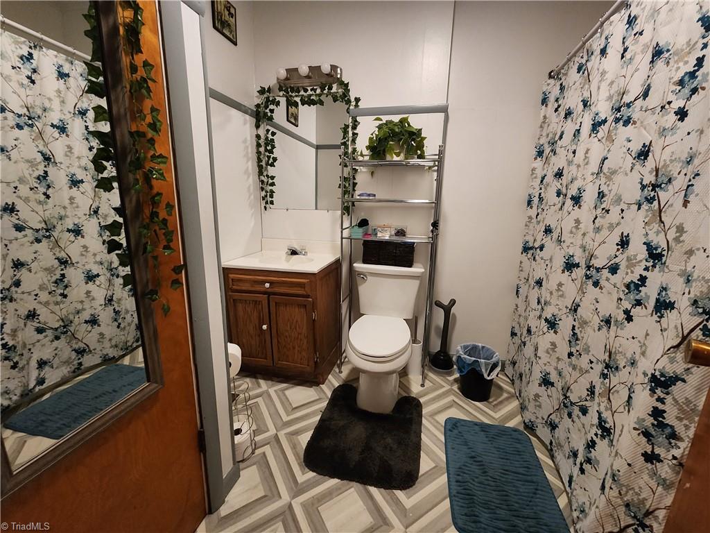 4521 Huff Road Archdale, NC 27263 - Photo 12 of 18 Full Bath with new floors, new toilet, and double linen closets!