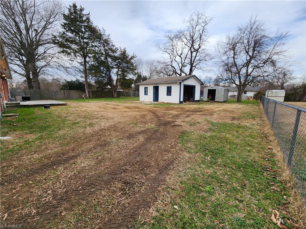 4521 Huff Road Archdale, NC 27263 - Photo 14 of 18 Drive right through the double gate to your one bay garage building