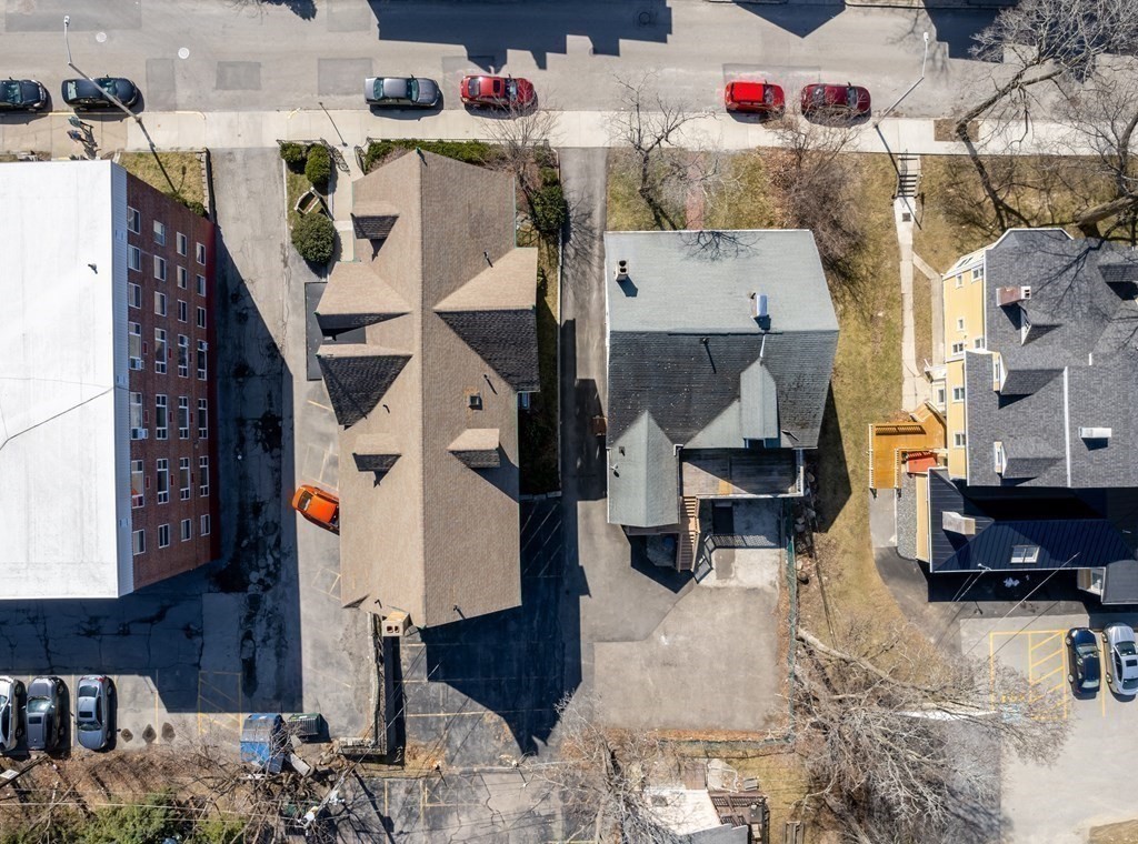 36 Cedar Street, Unit 1A Worcester, MA 01609 - Photo 16 of 19 an aerial view of residential houses with outdoor space