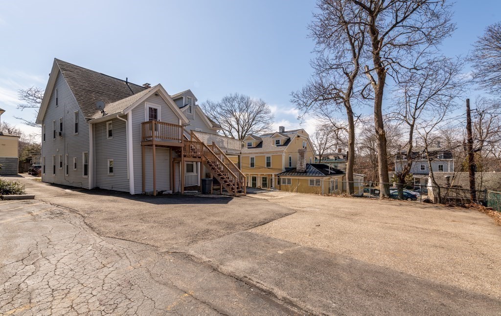 36 Cedar Street, Unit 1A Worcester, MA 01609 - Photo 4 of 19 a view of a house with a snow in front of it