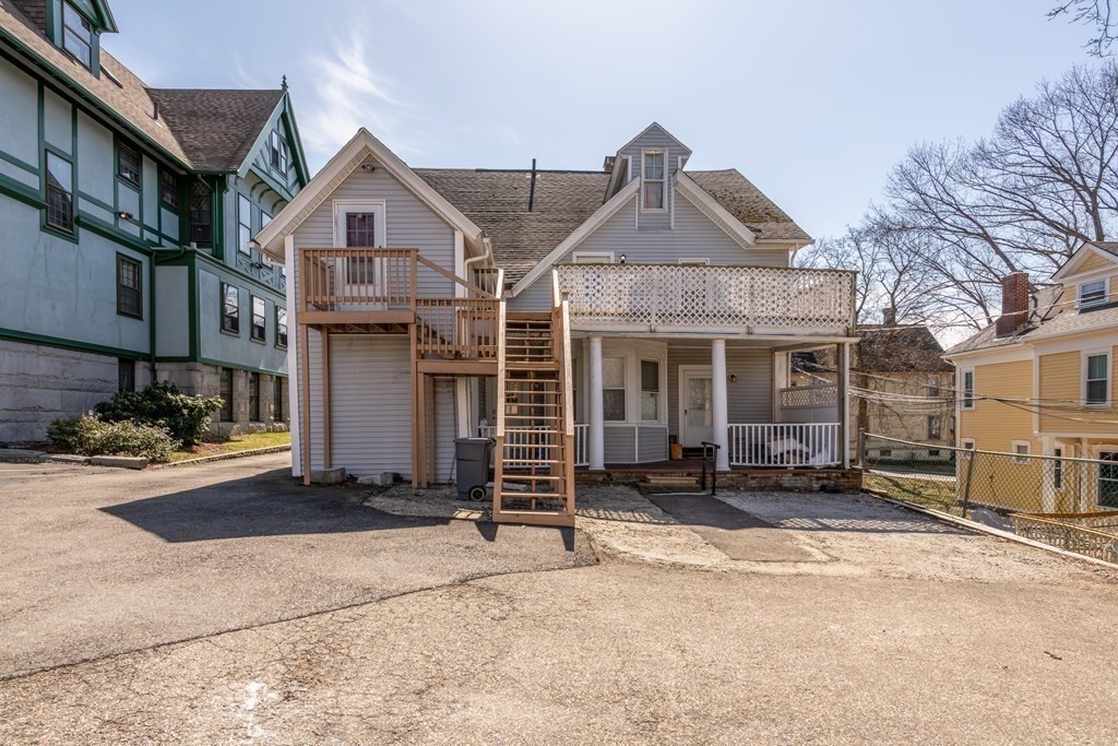 36 Cedar Street, Unit 1A Worcester, MA 01609 - Photo 9 of 19 a front view of a house with a yard