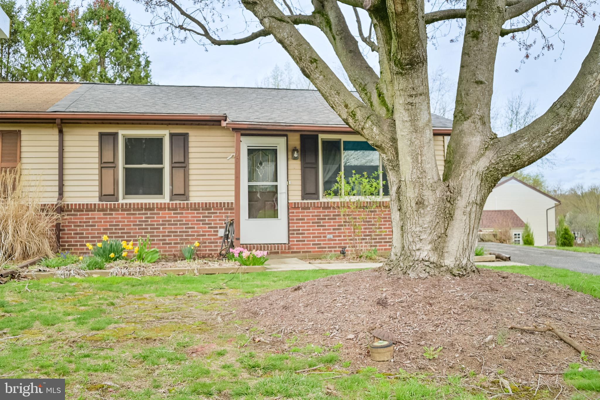 17 Turnbridge Drive Lancaster, PA 17603 - Photo 22 of 32 a front view of a house with garden