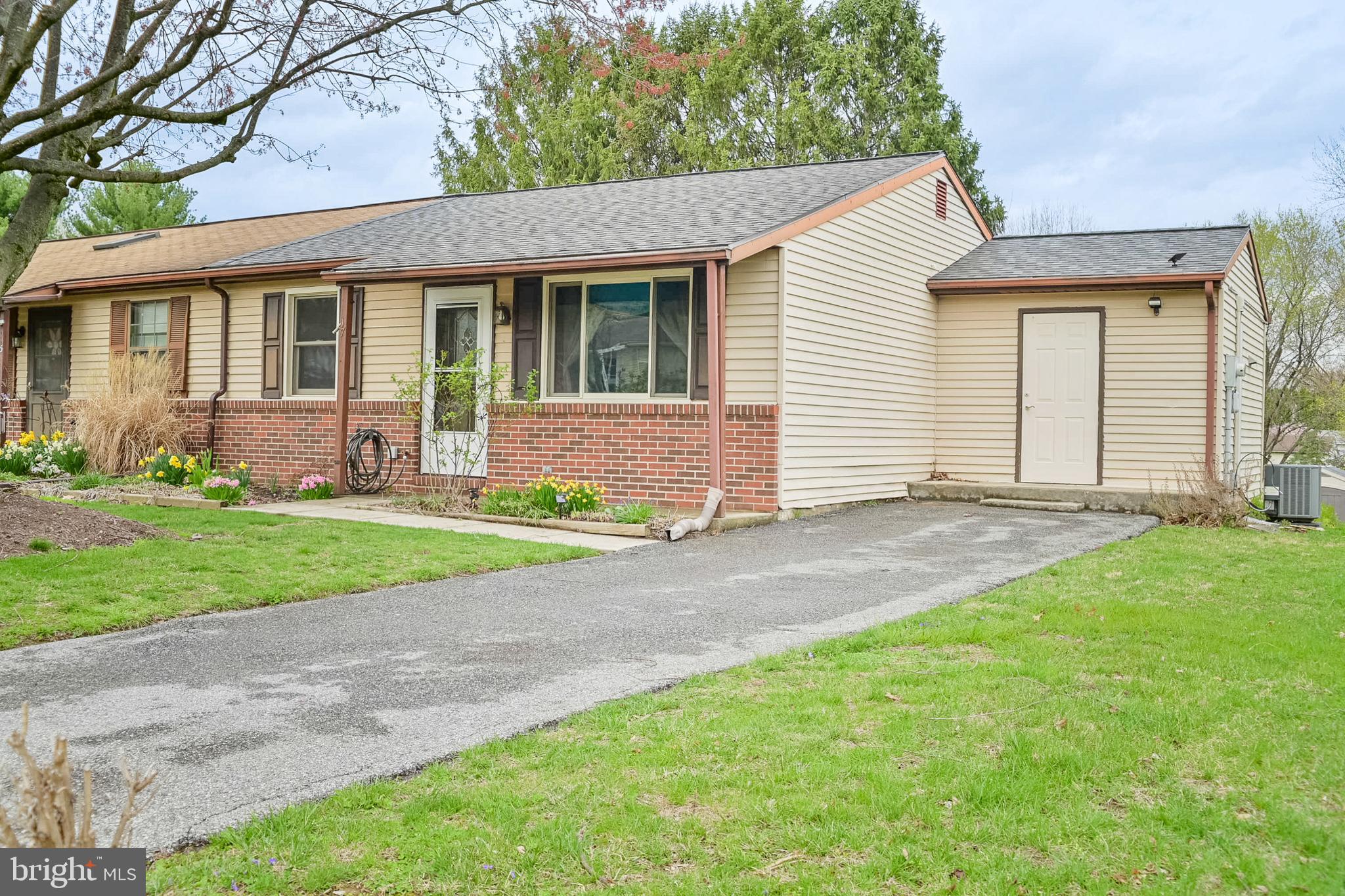 17 Turnbridge Drive Lancaster, PA 17603 - Photo 23 of 32 a front view of a house with a yard and garage