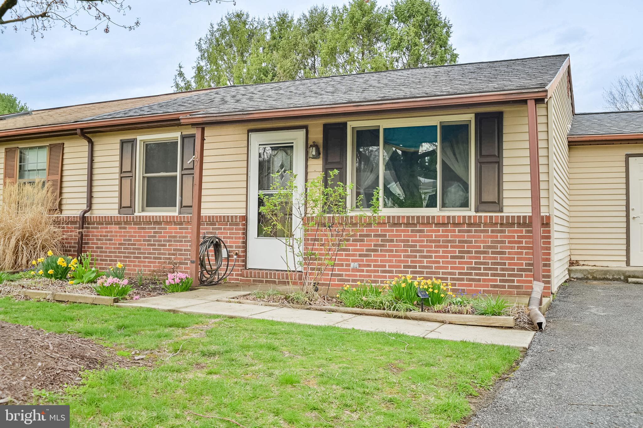 17 Turnbridge Drive Lancaster, PA 17603 - Photo 24 of 32 a front view of a house with a yard