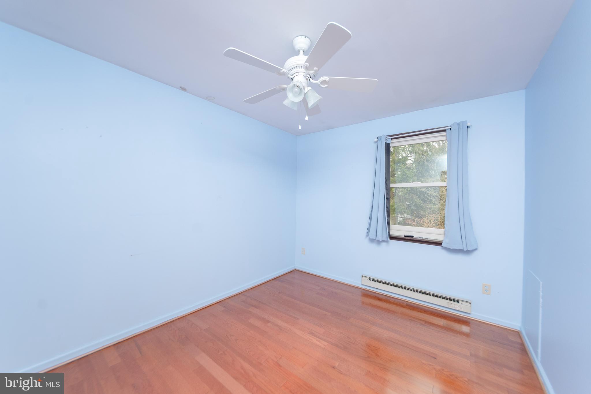 17 Turnbridge Drive Lancaster, PA 17603 - Photo 4 of 32 an empty room with a window and a fan