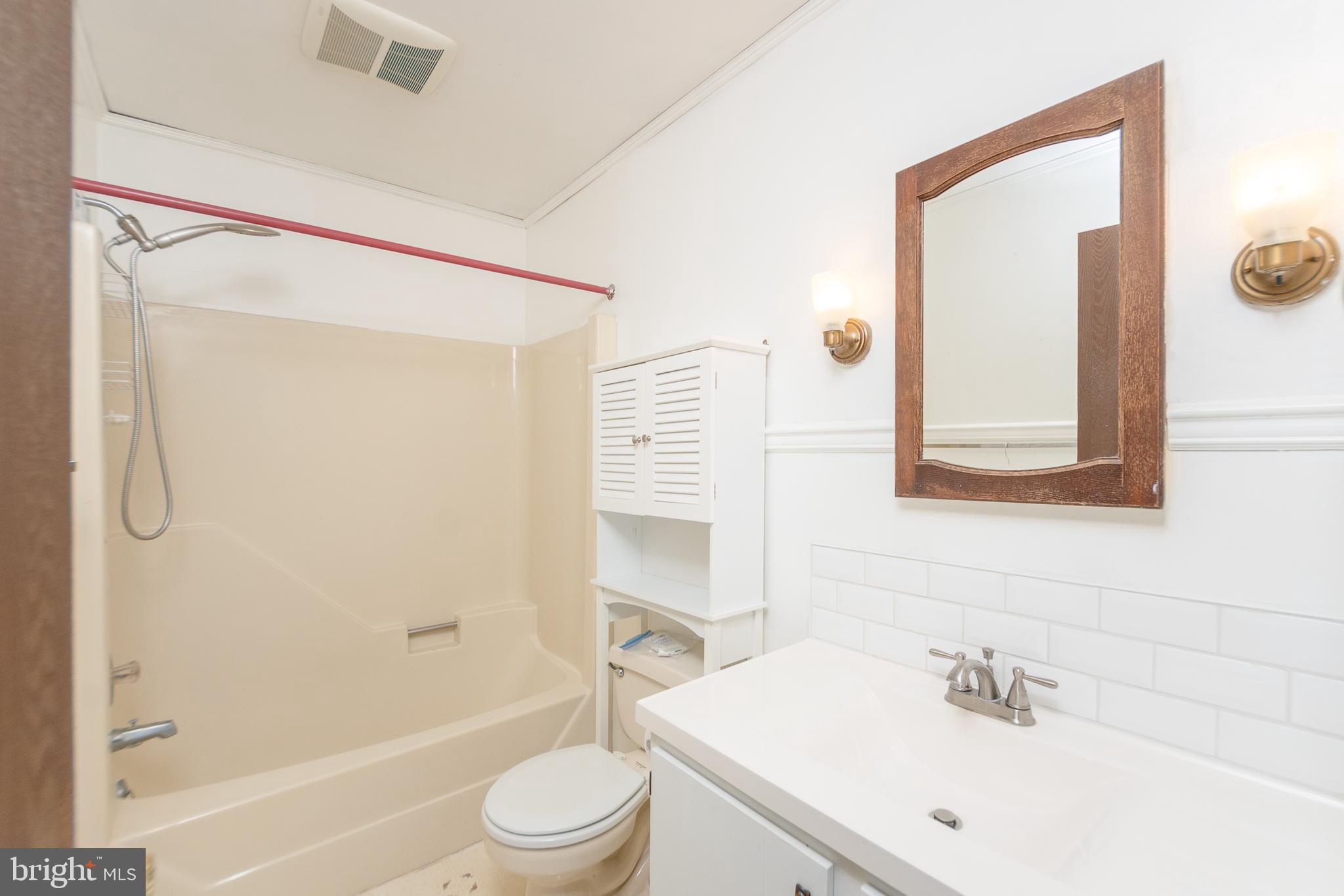 17 Turnbridge Drive Lancaster, PA 17603 - Photo 6 of 32 a bathroom with a sink a toilet and shower