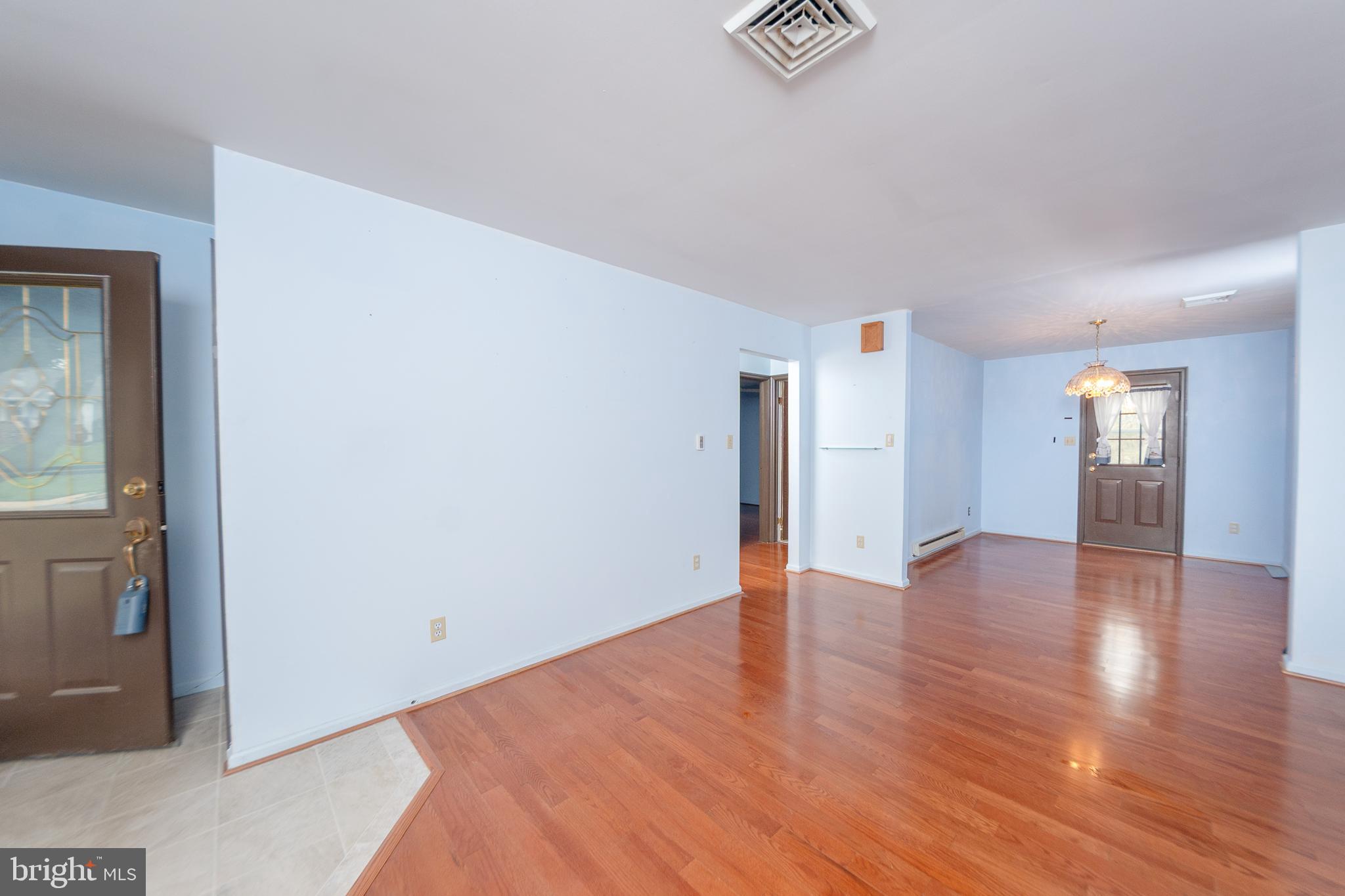 17 Turnbridge Drive Lancaster, PA 17603 - Photo 10 of 32 a view of an empty room with wooden floor and a window
