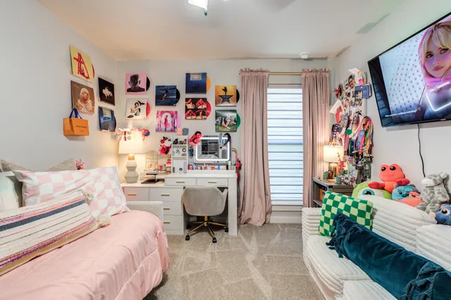 a bed room with a bed and a couch