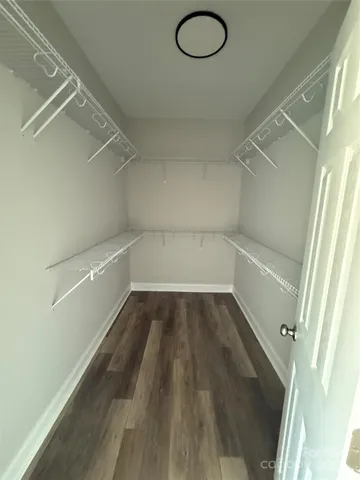 a view of a room with racks on the wall