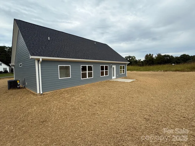 a house with river in front of it
