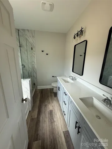 a bathroom with a sink and mirror
