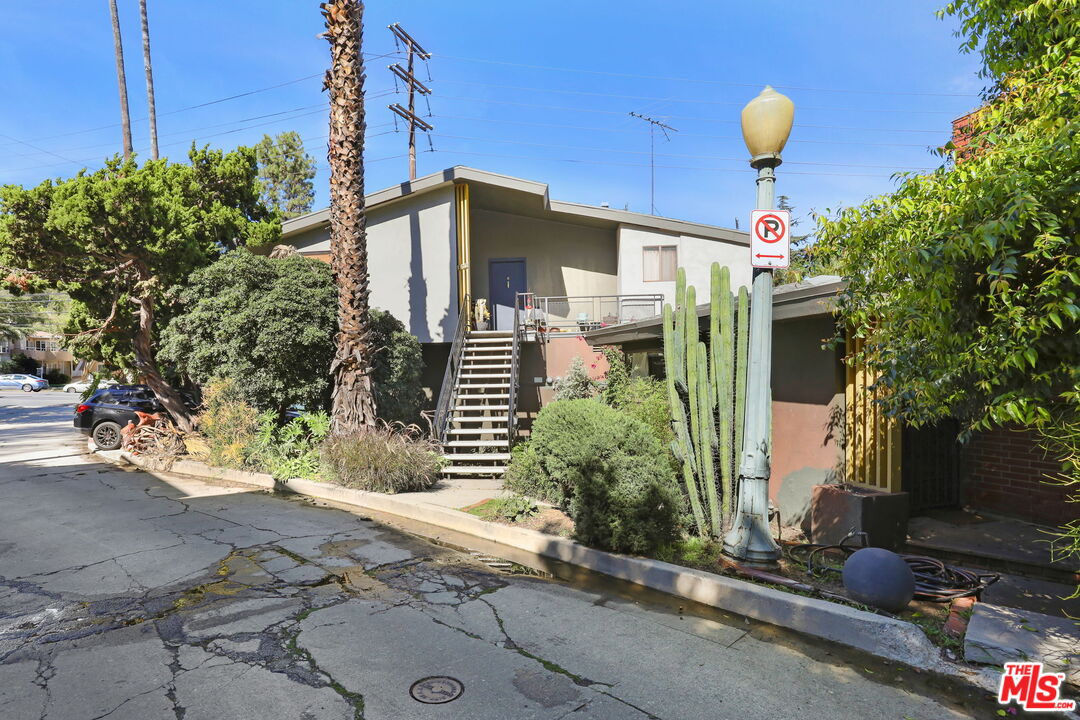 3765 Arbolada Road Los Angeles, CA 90027 - Photo 29 of 34 a front view of a house with garden