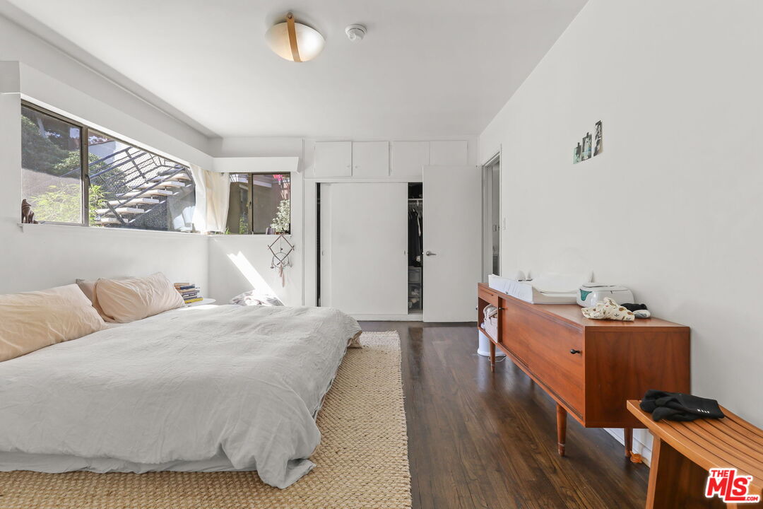 3765 Arbolada Road Los Angeles, CA 90027 - Photo 10 of 34 a bed room with a bed and a window